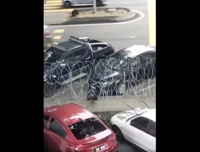 Cops looking for woman suspected of sneaking through barbed wire into EMCO area to visit grandmother at Pantai Dalam PPR