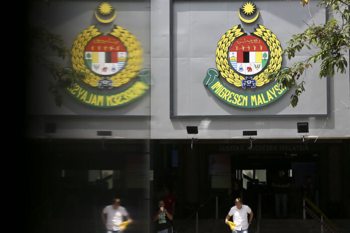 Immigration duo plead guilty to graft charges in Seremban