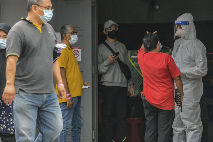 Malaysia’s new Covid-19 cases hover round 20,000-mark today with record 19,819 infections