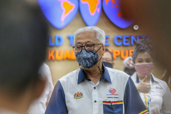 PM tells factory owners in Malaysia to set up own Covid-19 vaccination centres at premises