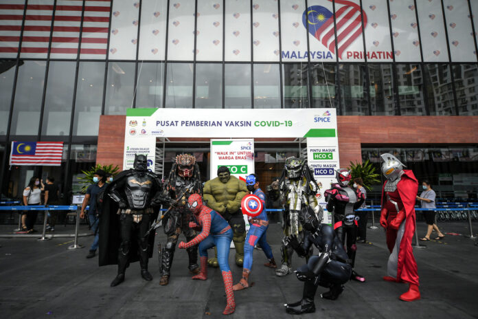 ‘Superheroes’ assemble at Penang PPV to spread joy, get vaccinated