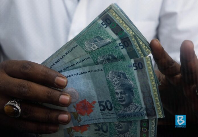 Ringgit opens lower against US dollar