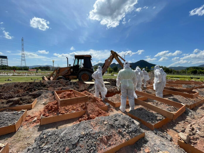 Jawi uses backhoes to speed up funeral process for Covid-19 victims