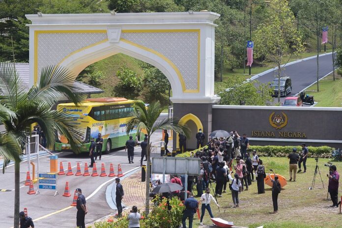 Bus ferrying second batch of Bersatu lawmakers arrives at Istana Negara