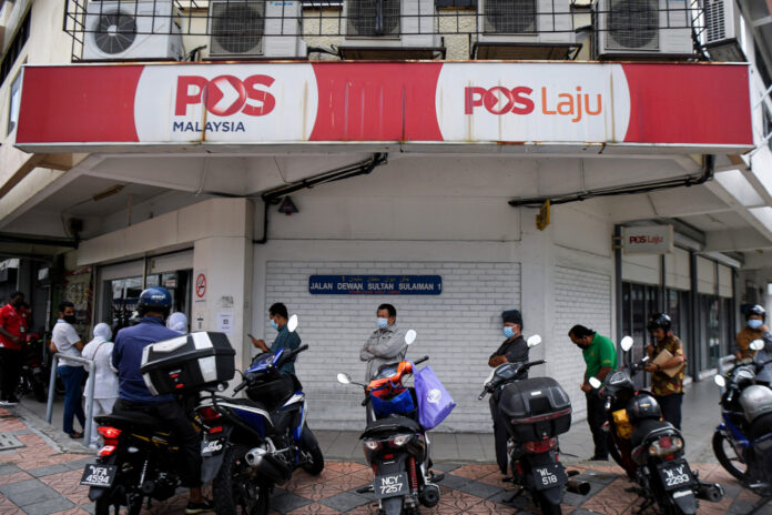 Pos Malaysia to end contracts of 262 outsourced Pos Rider agents in Klang Valley