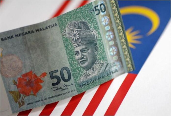 Ringgit falls to one-year low as Muhyiddin’s resignation as PM looms