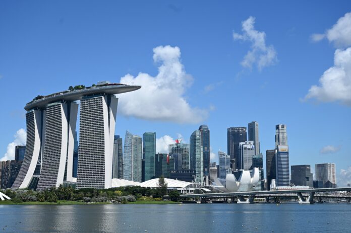 Singapore to give vaccine boosters as cases rise