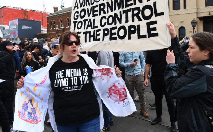 Police trampled, hundreds arrested in Melbourne anti-lockdown protest