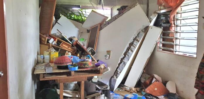 Family escapes unhurt as house damaged by rocks, soil