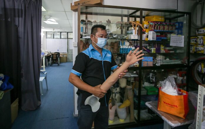 From construction worker to operating a business dealing in orthotics and prosthetics, Ipoh amputee takes it one step at a time