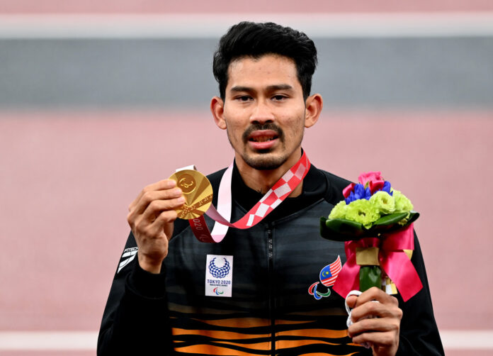 Mum wills son to long jump gold with screams of ‘Fly Latif… fly Latif!’