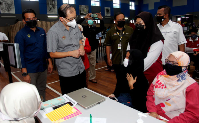 Deputy education minister urges schools to tone down on air-conditioning to curb spread of Covid-19