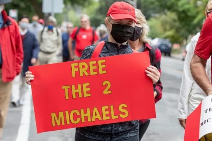 Marchers walk 7,000 steps for Canadian pair detained by China