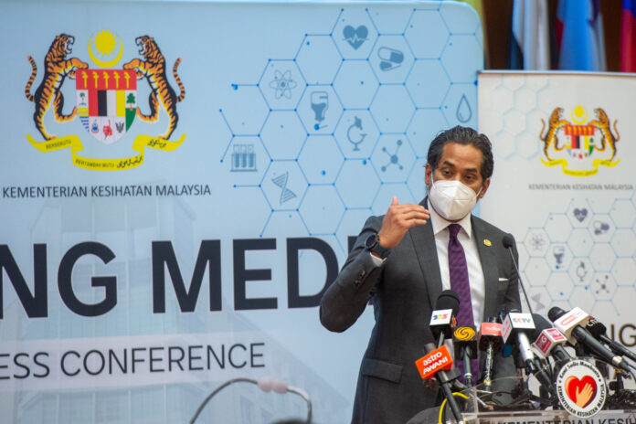 Khairy: Those already vaccinated against Covid-19 but still awaiting digital certs can use physical cards issued by PPVs