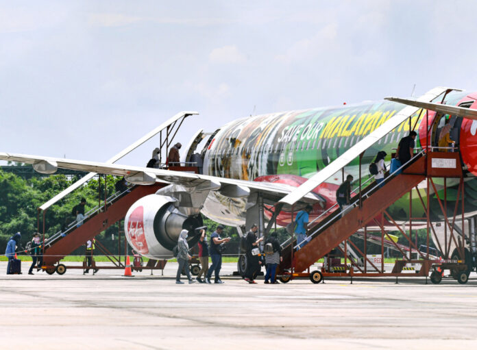 Tourism minister says travellers to Langkawi who test positive for Covid-19 can reschedule flight tickets, hotel reservations