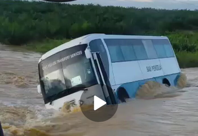 Seven passengers of bus stranded in flooded road rescued