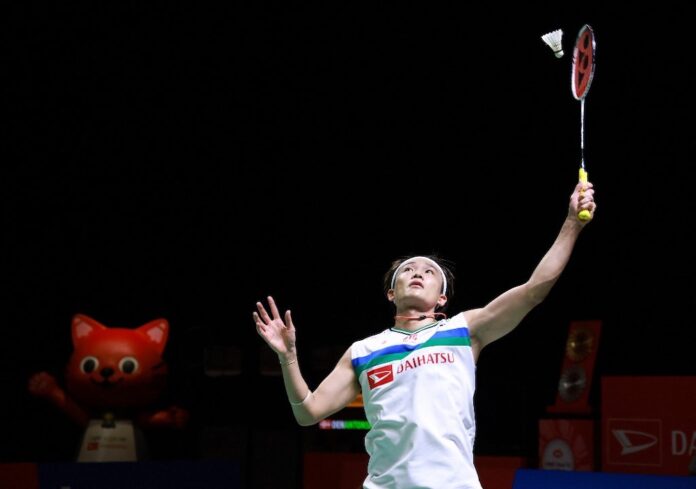 Badminton ace Momota claims first post-crash international trophy