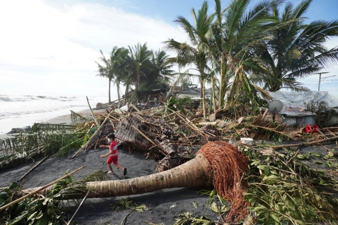 12 dead as powerful typhoon batters the Philippines
