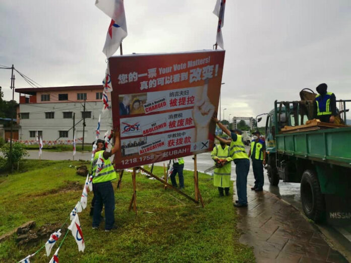DAP's Batu Kawah candidate says left 'frustrated' after EC task force removes billboard with chainsaw