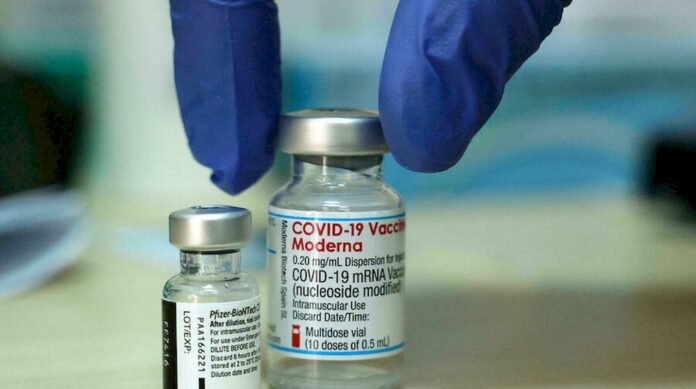 Moderna says booster dose of its Covid-19 vaccine appears protective vs. Omicron