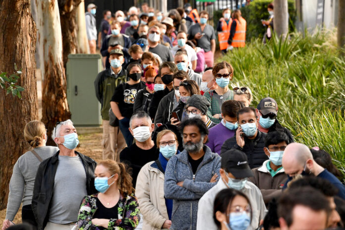 Australia's most populous state to reinstate some Covid-19 curbs