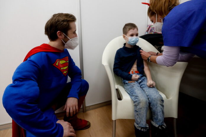Superman, Cinderella and Minions give Czech children Covid-19 shots