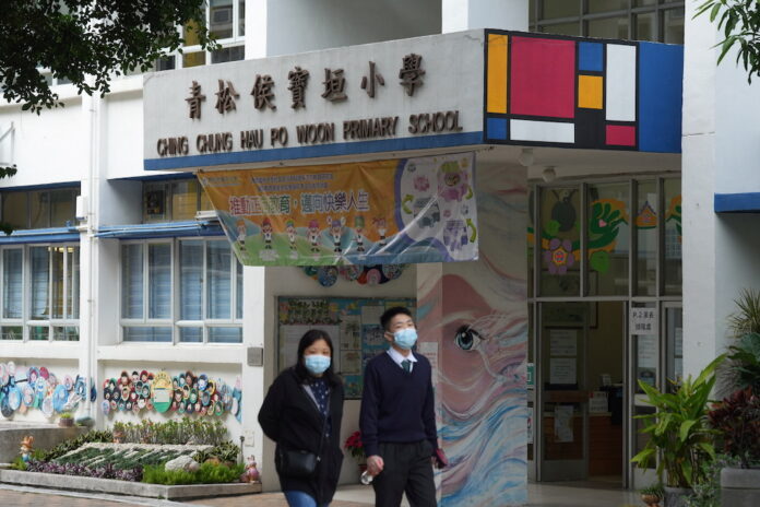 Hong Kong to shut secondary schools from Monday over Covid fears