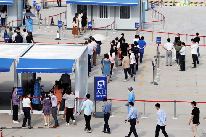 China reports fewest daily local confirmed Covid-19 cases in two weeks