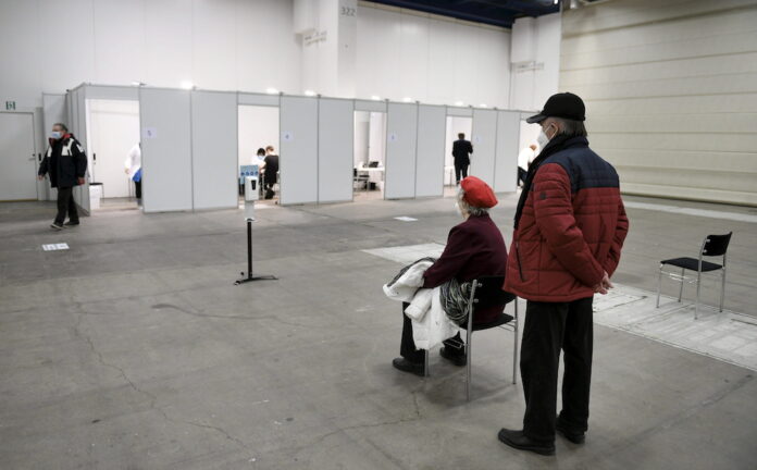 Finland cuts quarantine times as Covid pressure mounts