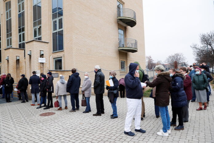 Hungary's daily tally of new Covid-19 cases jumps to new record of 14,890
