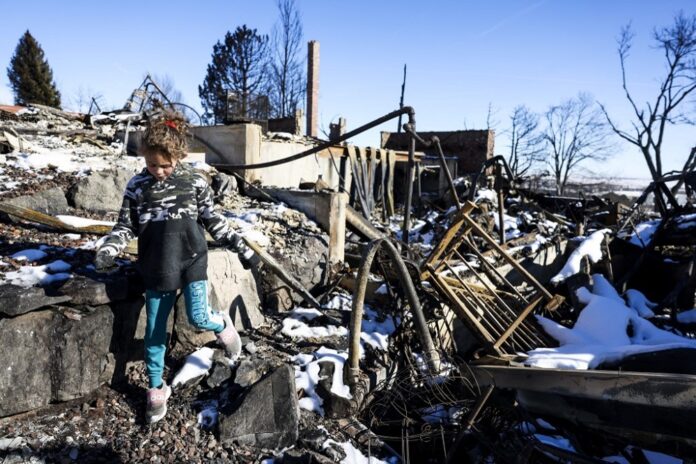 Biden calls Colorado's most destructive wildfire 'code red' climate warning