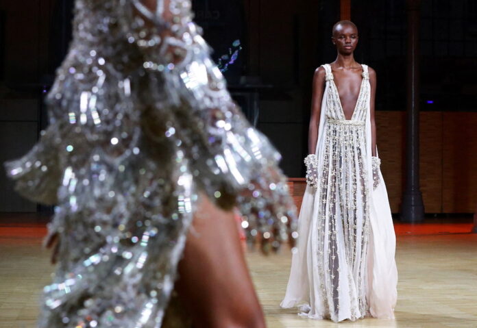 Elie Saab brings vibrant looks to Paris catwalk on return