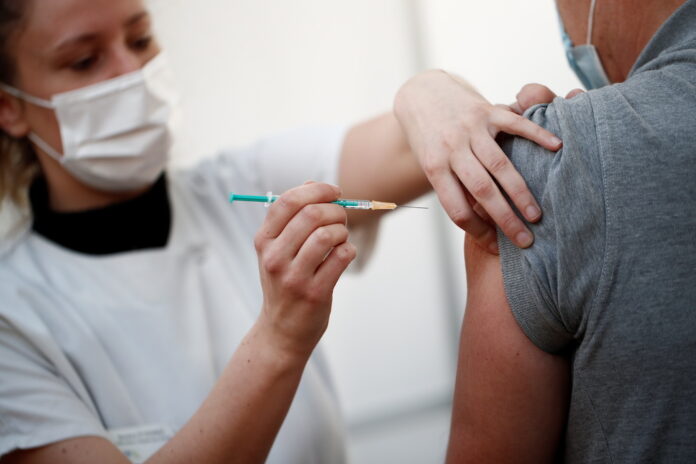 French lawmakers to vote on Covid vaccine pass amid death threats