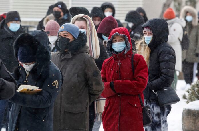 Canada's Ontario to start lifting Covid-related curbs, Quebec more cautious