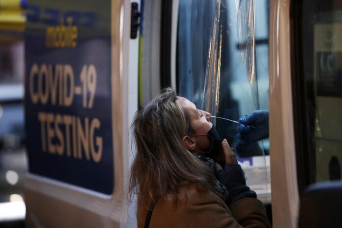 Weaker virus? Herd immunity? Omicron sparks cautious hopes