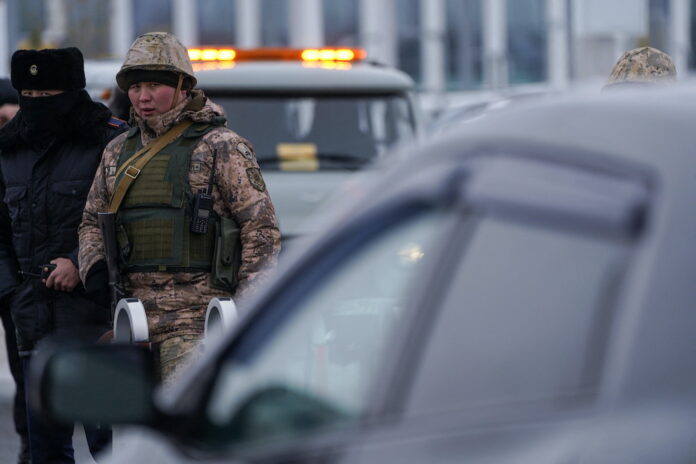 Kazakhstan detains ex-security chief as crisis convulses nation