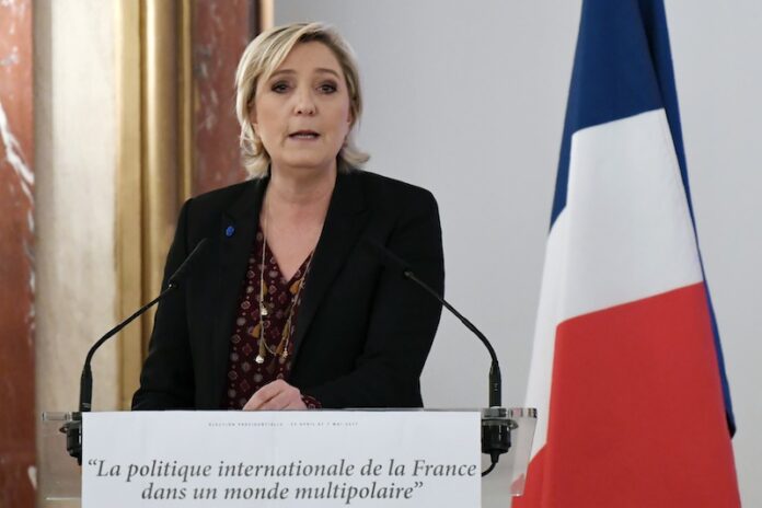 Le Pen shrugs off defections in battle for French far-right