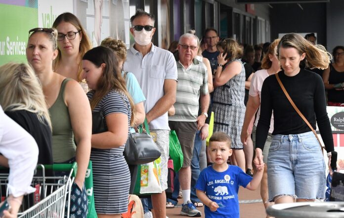 Australia suffers deadliest day of pandemic as Omicron drives up hospital cases