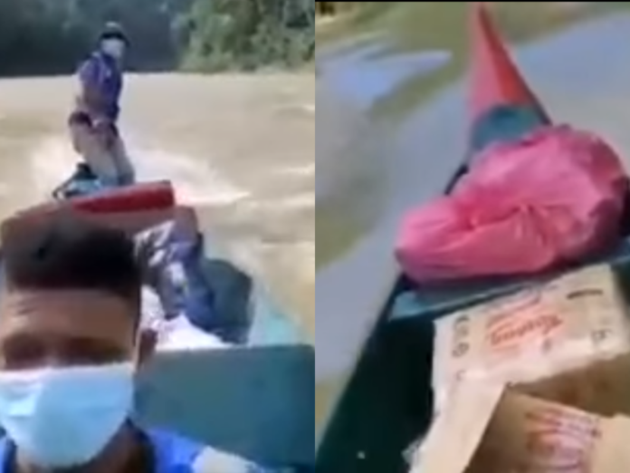 Civil Defence Force personnel escape unharmed after boat carrying flood relief supplies capsizes in Pahang (VIDEO)
