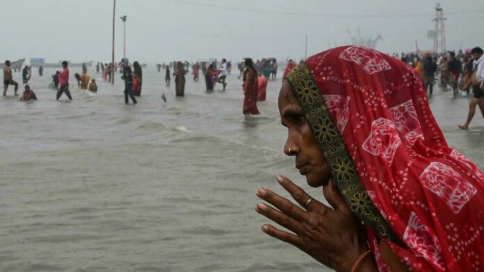 Drones spray holy water at India Hindu festival as huge crowds defy Covid rules