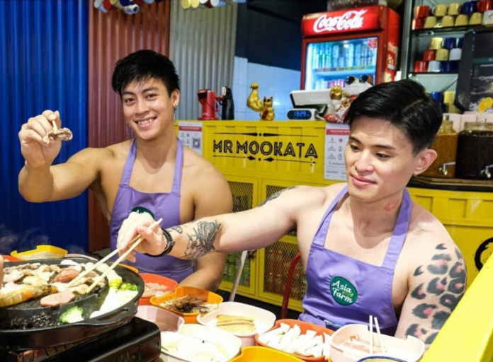 Police visit restaurant in Singapore following complaints of promoters being naked