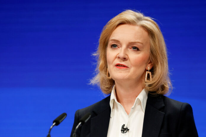 UK's Truss offers '100pc' support for embattled PM Johnson
