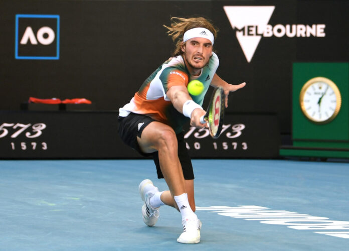 Swearing Tsitsipas pushed all the way to reach third round