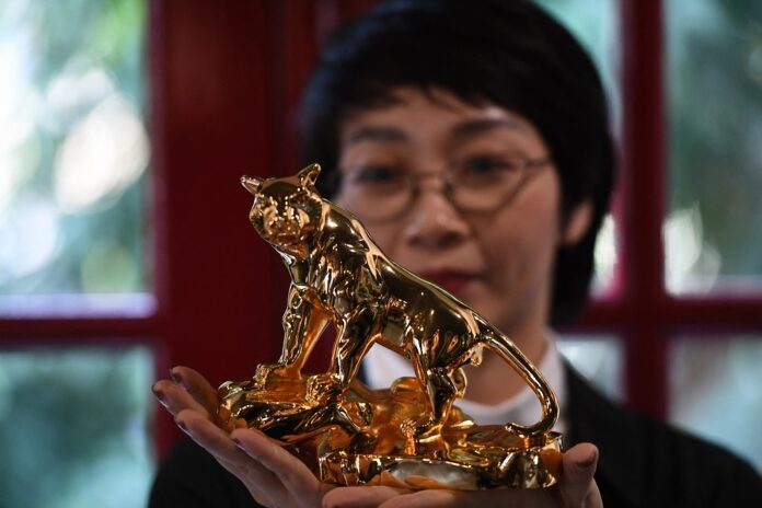 Burning bright: Vietnam's gold-plated New Year tiger