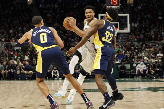 Giannis pours in 50 in Bucks' victory, Celtics win ninth straight