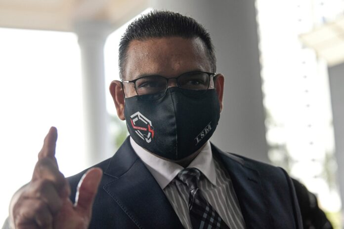 Syariah CJ Mohd Na'im drops defamation suit against Lokman Adam after apology from latter