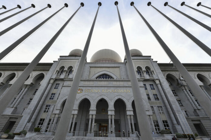 Hearing of lawyer's bid for leave to appeal in suit over legality of Anwar's royal pardon on March 22