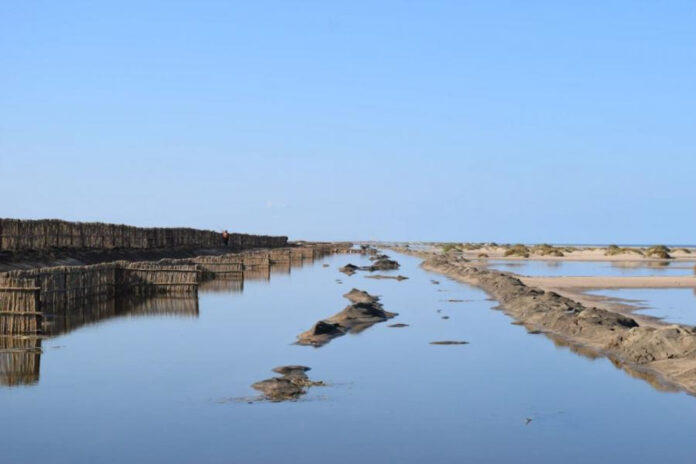 Egypt erects sand barriers as rising sea swallows the Nile Delta