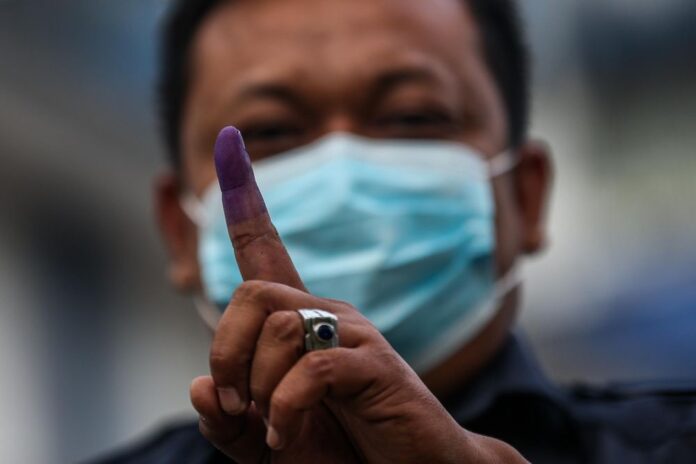 Johor police chief: If anyone tries to stop you from voting this Saturday, lodge a report