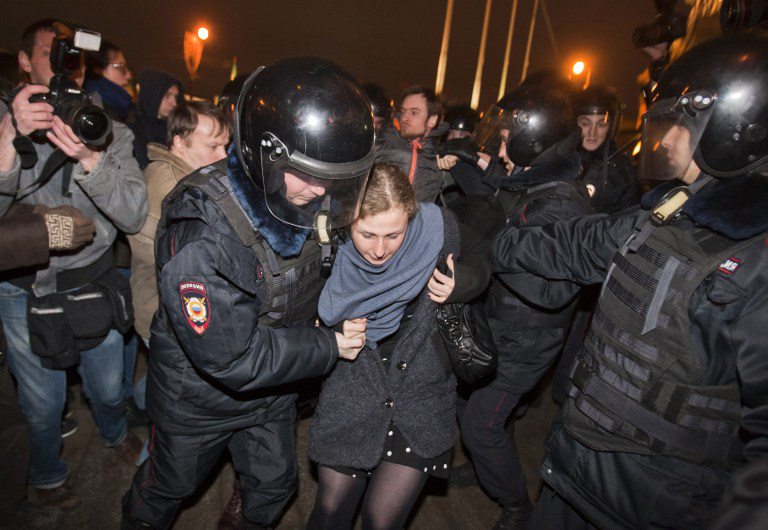 Pussy Riot member leaves Russia disguised as delivery courier